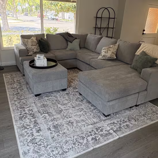 The OC Bros movers in Anaheim staging furniture for client.