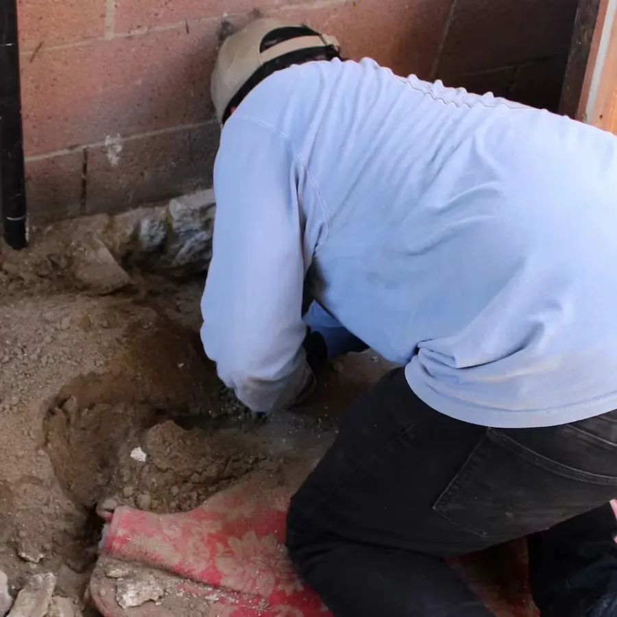 The OC Bros Crew clearing concrete debris during a junk removal project in Orange County